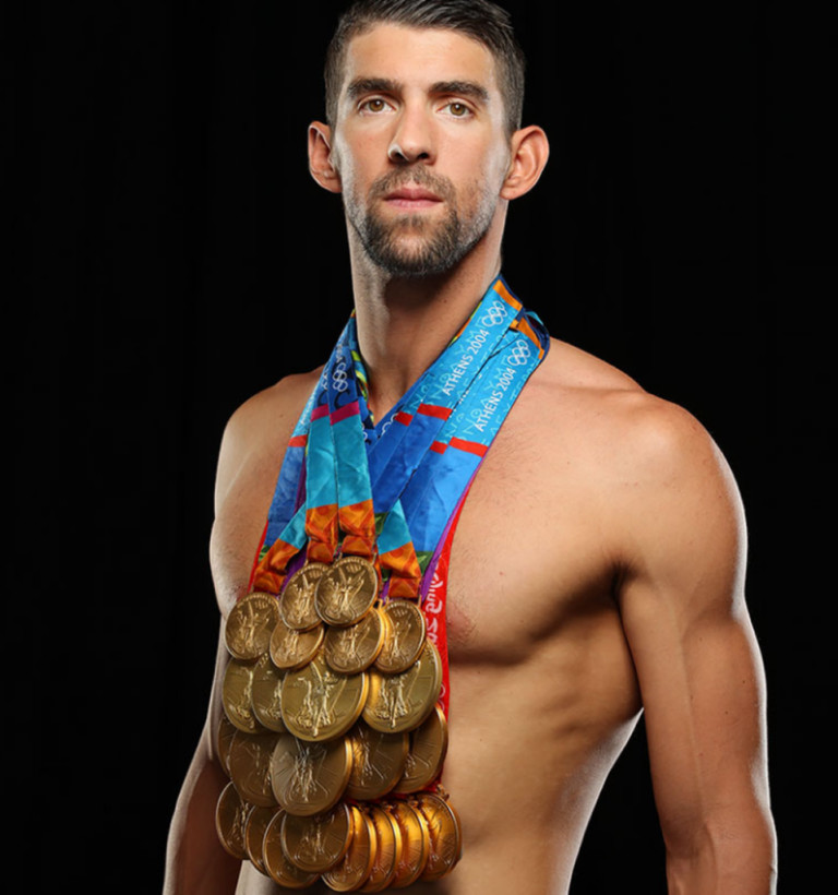 Michael Phelps en séance « photos magique » avec ses 28 médailles olympiques