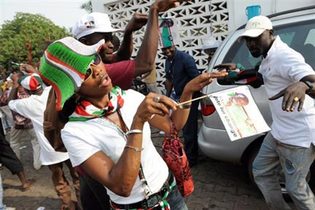 Les militants du candidat de l'opposition, John Atta-Mills en fête (Photo © AFP)