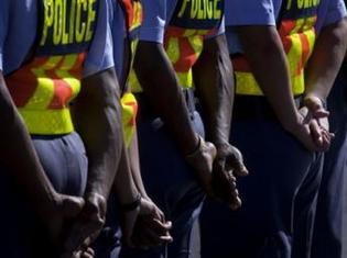 1 000 policiers sont derrière les barreaux en Afrique du Sud. AFP / Rodger Bosch