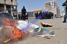 Reportage Photos: Les représentations de Wade tabassées et brulées par les manifestants