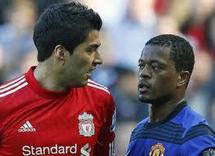 Pour propos racistes, Evra déterminé à poursuivre Suarez en justice