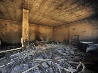 Un local des forces spéciales très endommagé, à Benghazi, le 15 juin 2013. REUTERS/Esam Al-Fetori