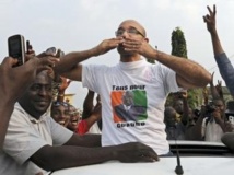 Michel Gbagbo à son arrivée au siège du FPI après sa mise en liberté provisoire, mardi 6 août 2013. AFP PHOTO / SIA KAMBOU