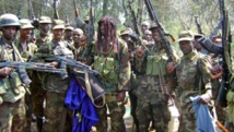 Des militaires ougandais fêtent une de leurs victoires sur la LRA dans le parc national de la Garamba, en République démocratique du Congo, le 18 décembre 2008. Reuters