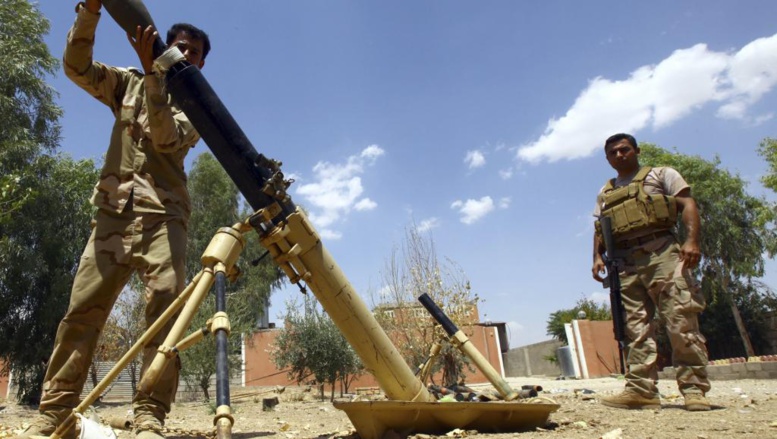 Des peshmergas, les combattants kurdes, lors de combats face aux jihadistes de l'Etat islmaique, près de Makhmour, le 6 août. REUTERS/Stringer