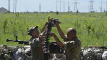 Des membres de forces armées ukrainiennes à Horlivka, au nord de Donetsk, le 6 juin 2015. Reuters/Oleksandr Klymenko